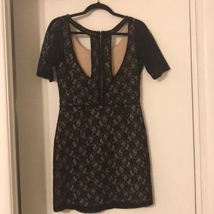 Black lace cutout dress with muse slip